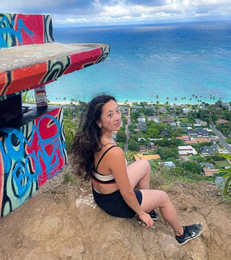 Photo of myself on top of Lanikai hike in Oahu Hawaii.