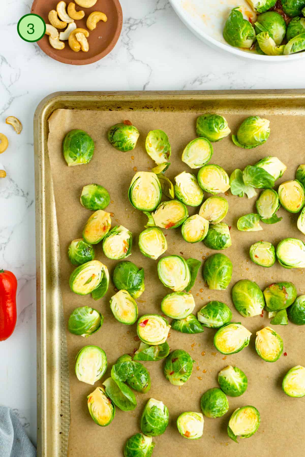 Roast the brussels sprouts in the oven in a single layer.