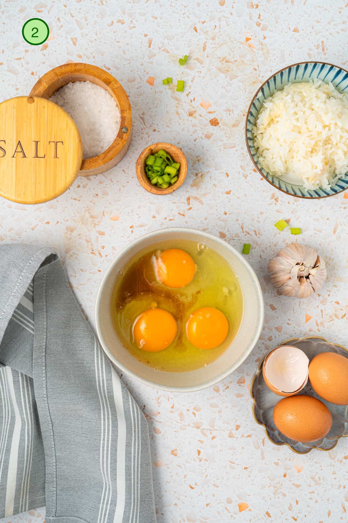 Whisk the eggs and seasonings in a bowl.