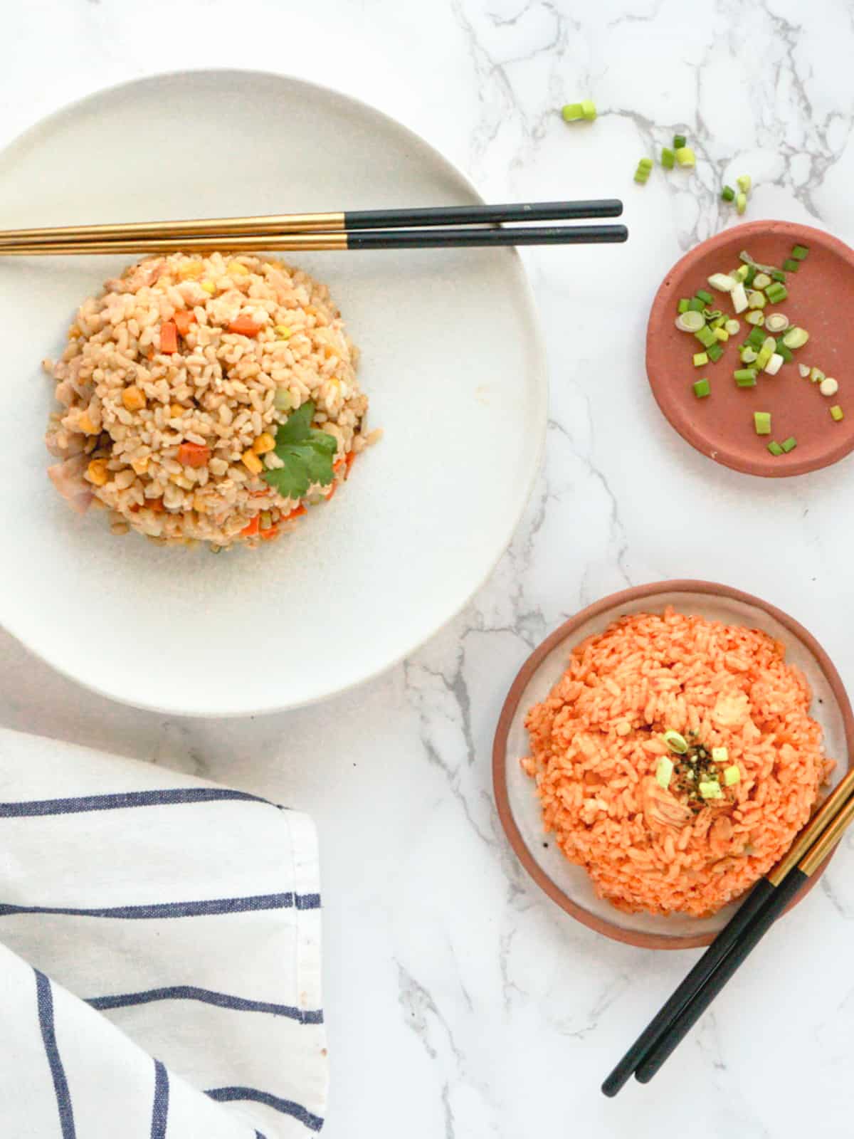 Overhead view of fried rice meal with chopsticks.
